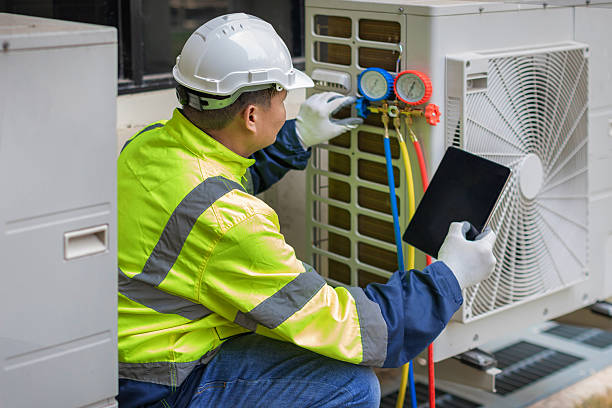 Professional Heat Pump Repair technician working in Oak Creek, WI